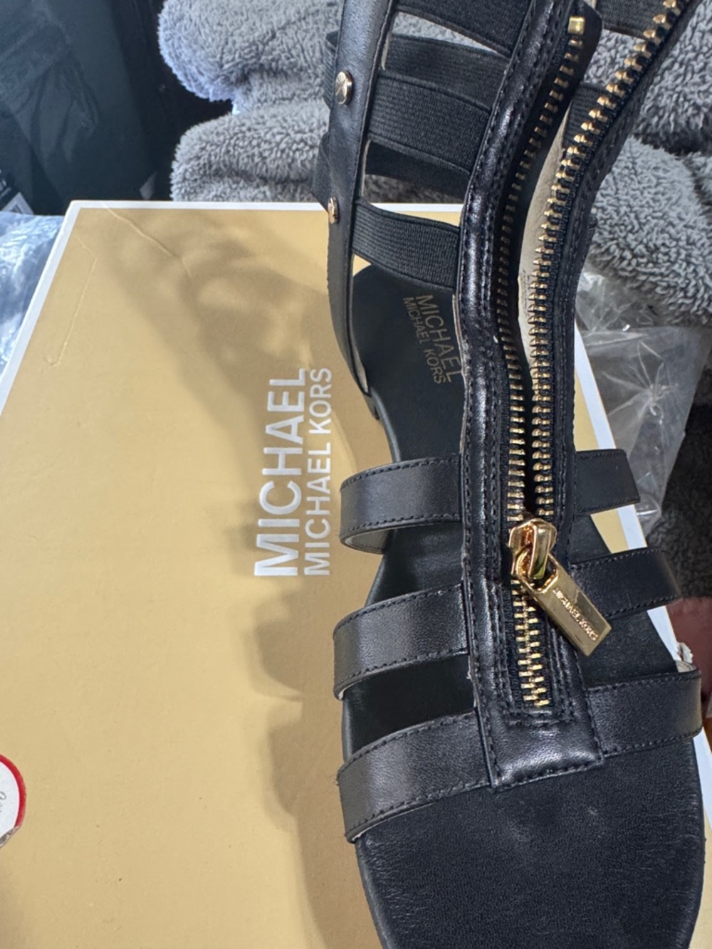 MICHAEL Michael Kors Black Leather Strappy Gladiator Sandals with Gold Zipper